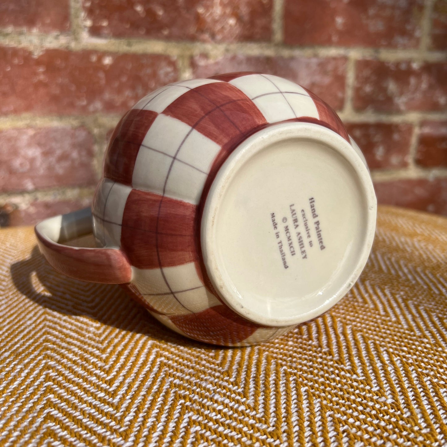 Checkered ceramic pitcher