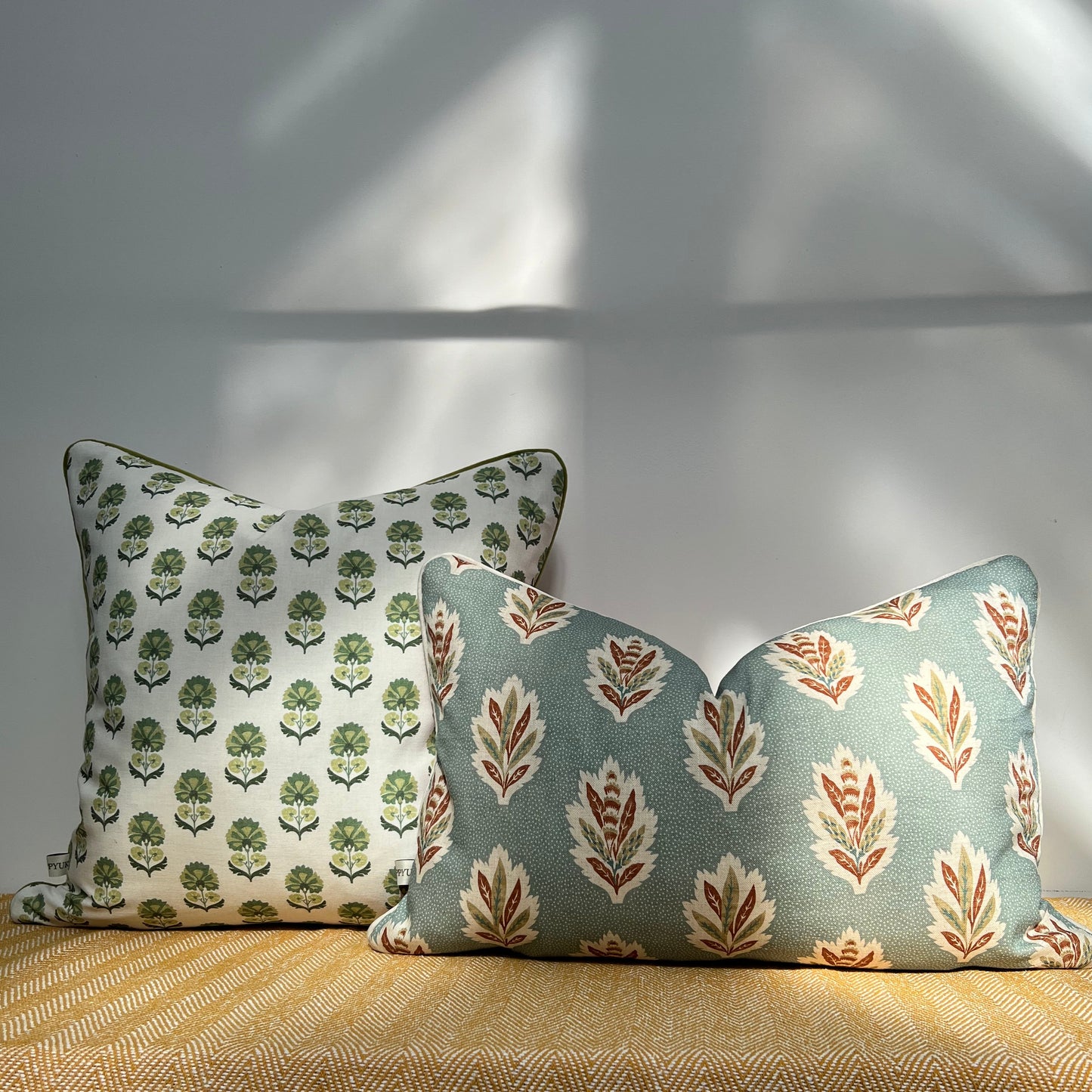 Green block print floral throw cushion, scatter cushion. Olive velvet piping