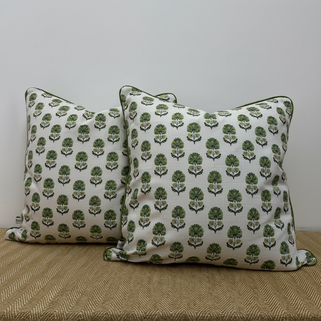 Patterned cushions on a plain background