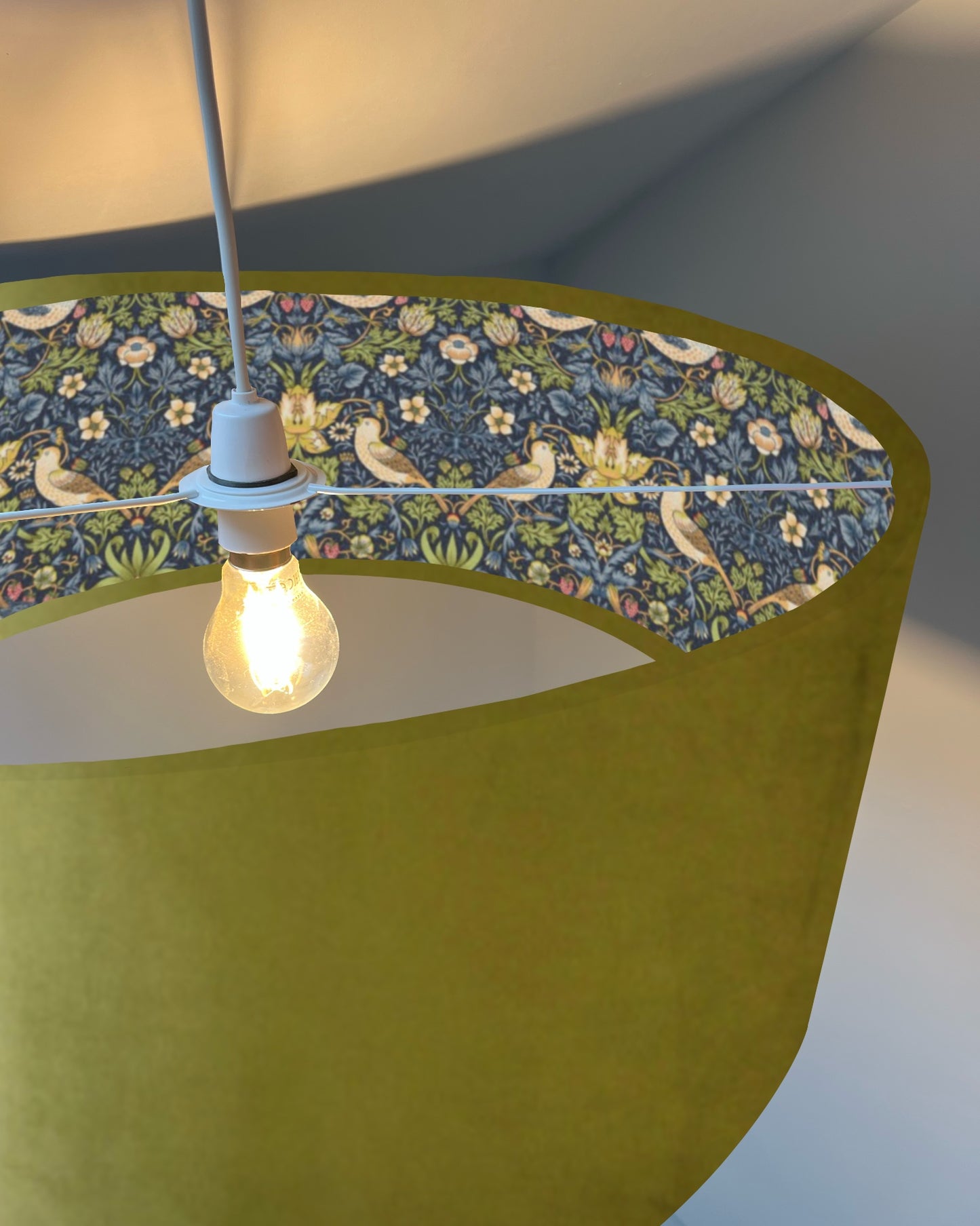 Olive green velvet drum lampshade, double sided lampshade, with navy strawberry thief cotton interior