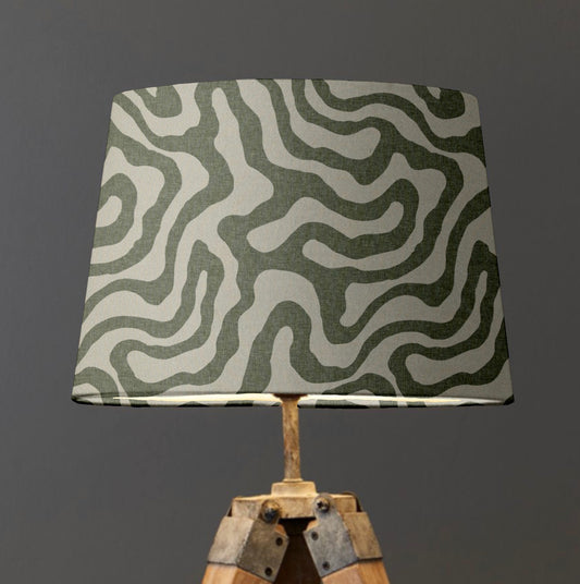 Green Wiggle french drum lampshade, paired with a white lining