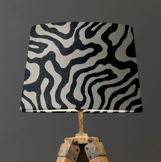 Black Wiggle french drum lampshade, paired with a white lining